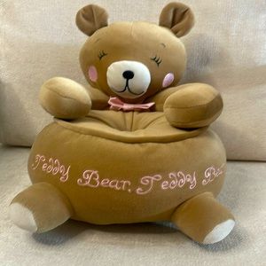 Teddy bear plush 11 inches tall.